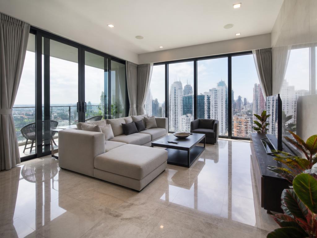 Modern Singapore condominium living room with full-height windows